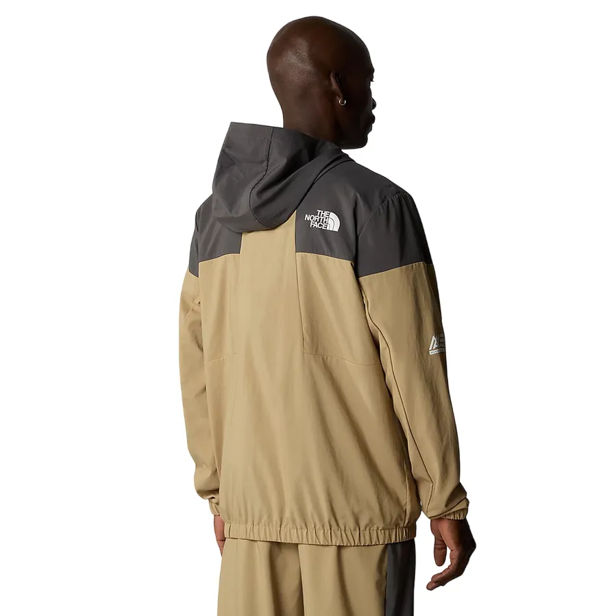 The North Face giacca a vento con cappuccia da uomo Track NF0A87J2WQO sabbia-antracite